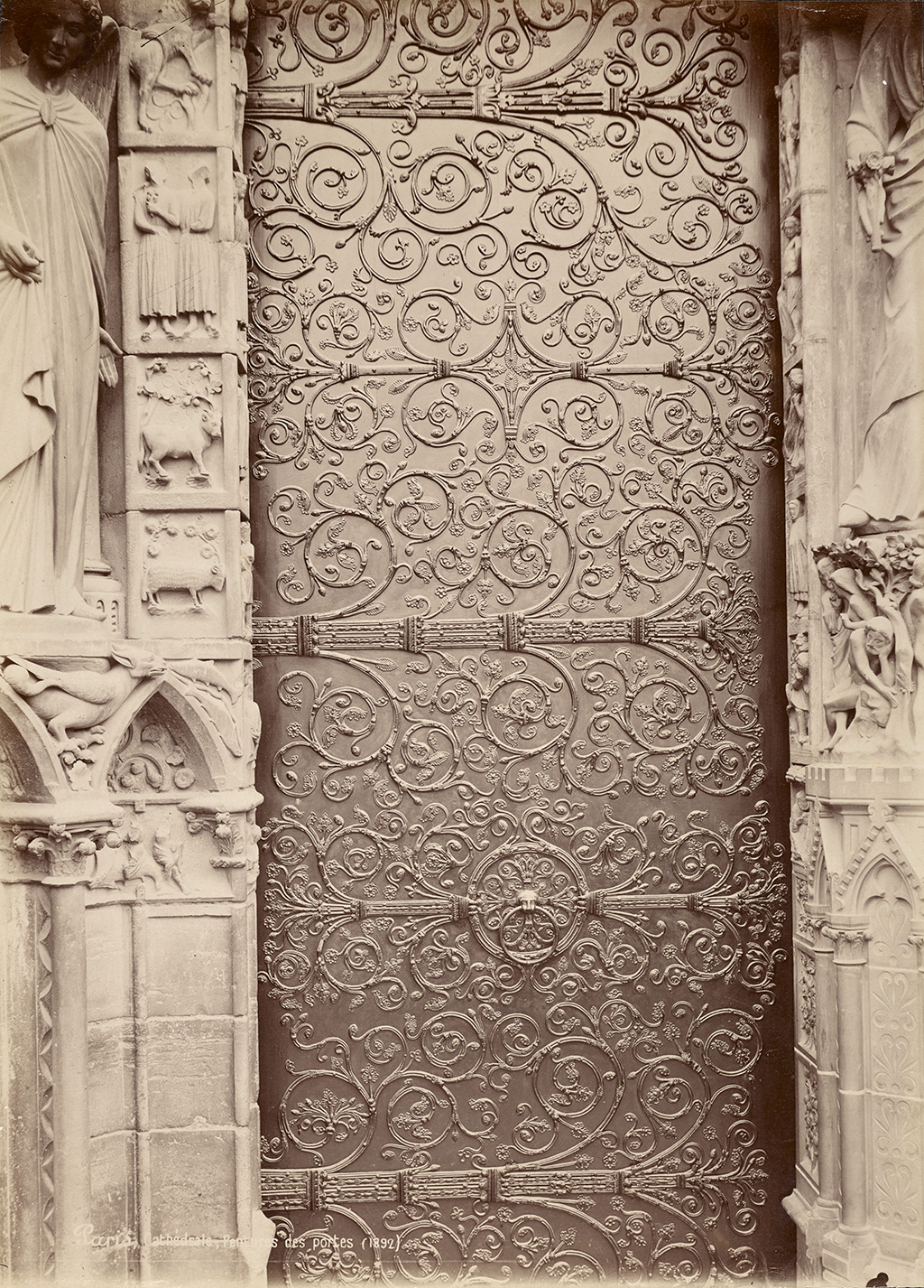 Médéric Mieusement, Notre Dame de Paris, portail gauche de la façade ouest, dit portail du couronnement de la Vierge. Vantail gauche